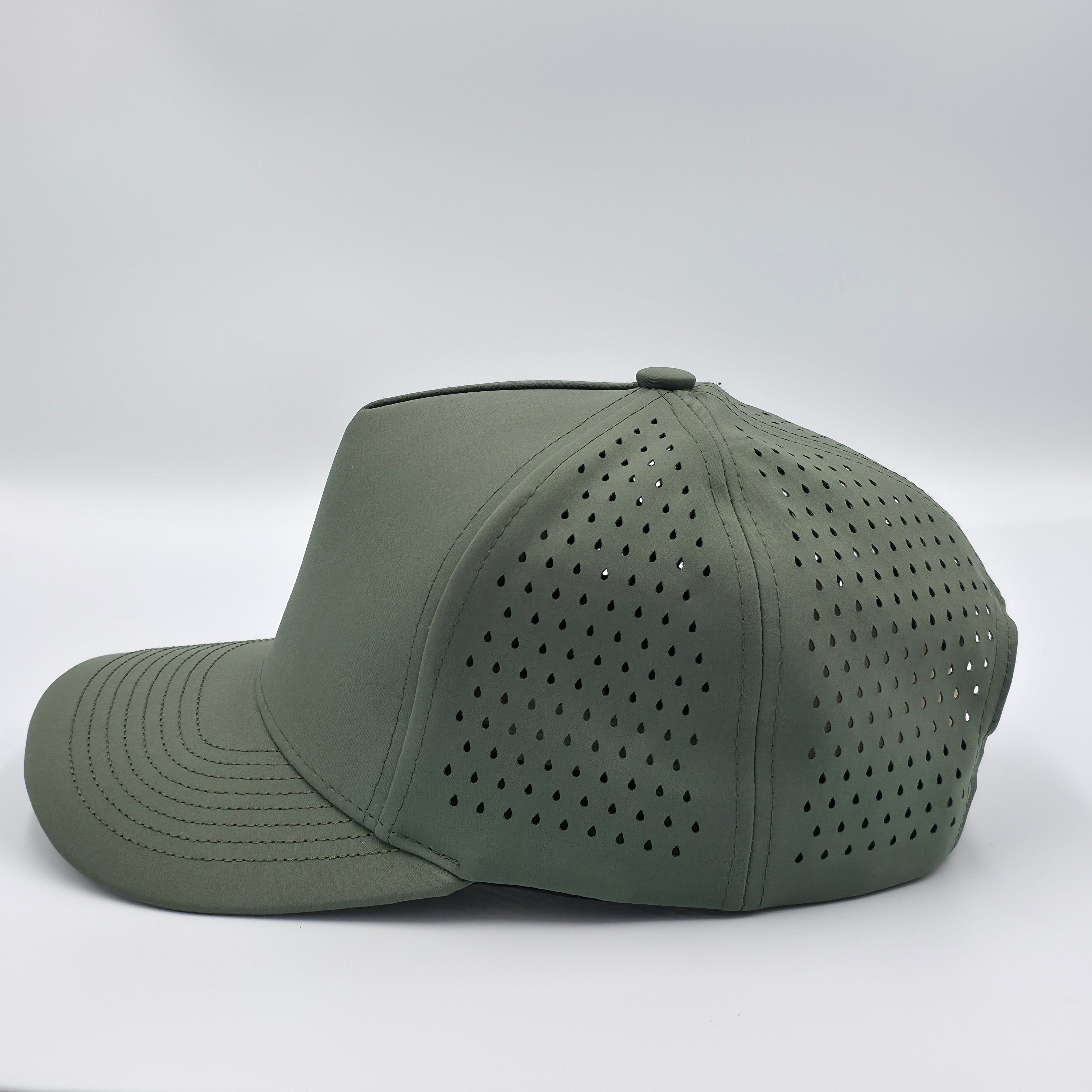 Green baseball cap with perforated design on a white background variant-classic-57cm-to-59cm-stratos-green