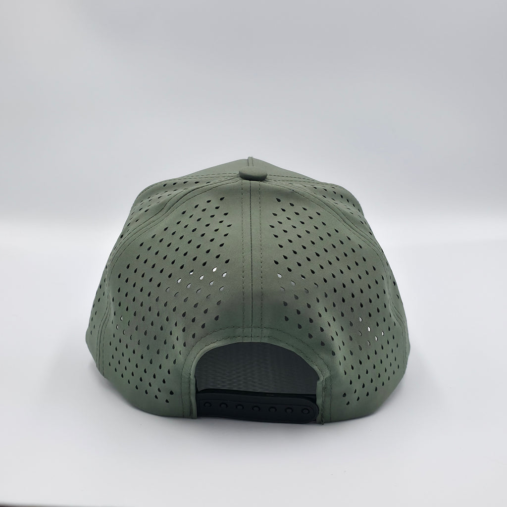 Green cap with perforated design on a white background variant-classic-57cm-to-59cm-stratos-green