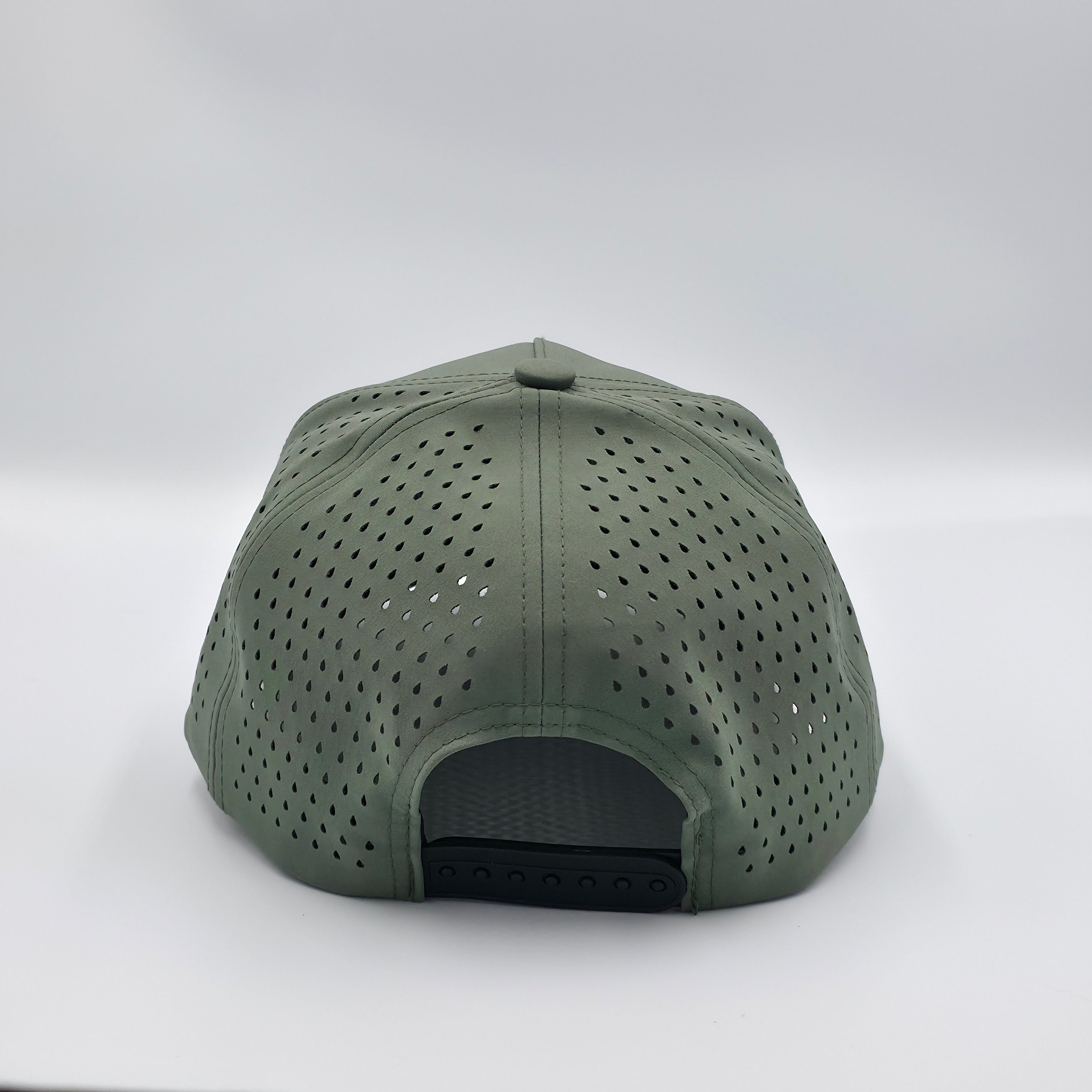 Green cap with perforated design on a white background variant-classic-57cm-to-59cm-stratos-green