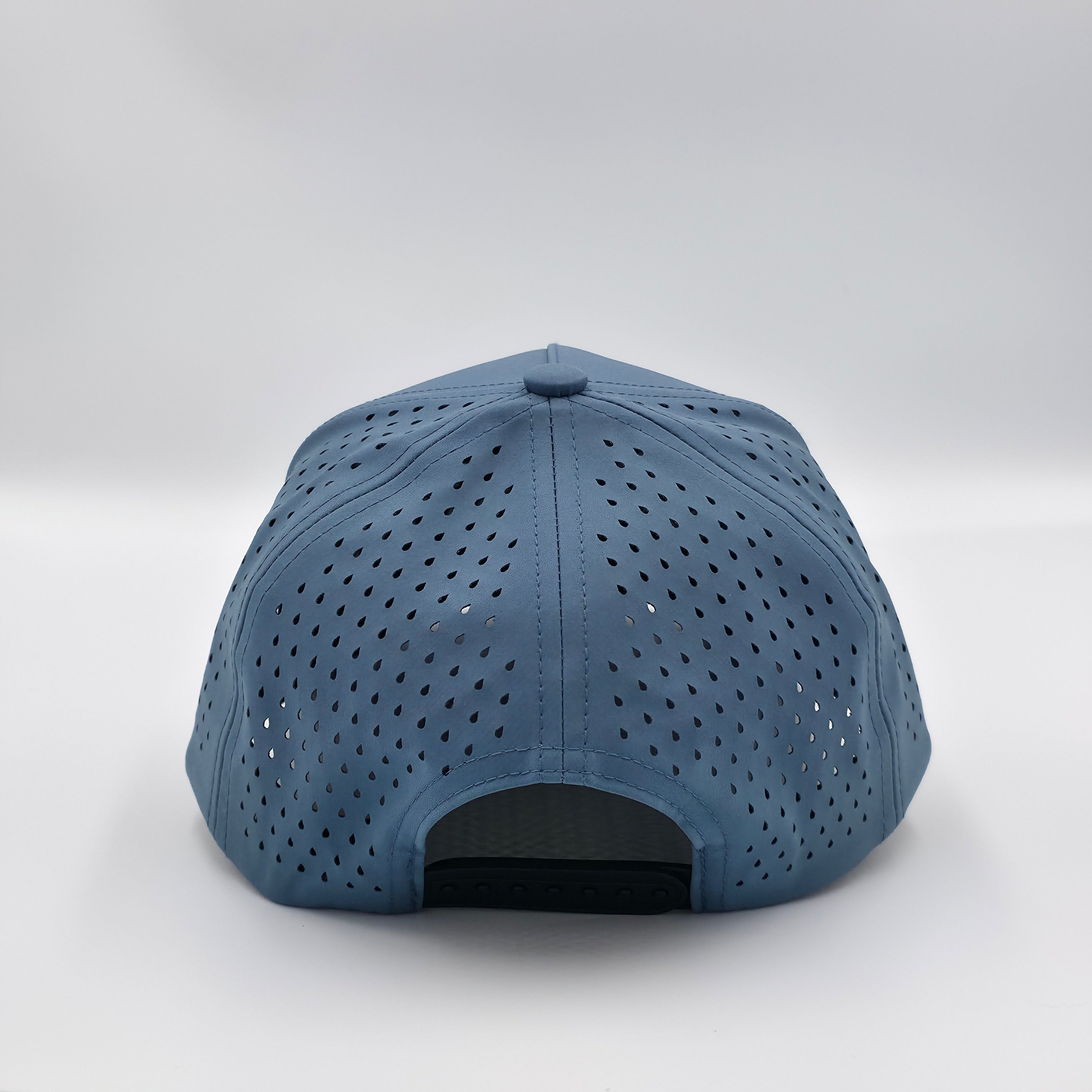 Blue cap with perforated design on a white background variant-classic-57cm-to-59cm-slate-blue variant-small-55cm-to-58cm-slate-blue