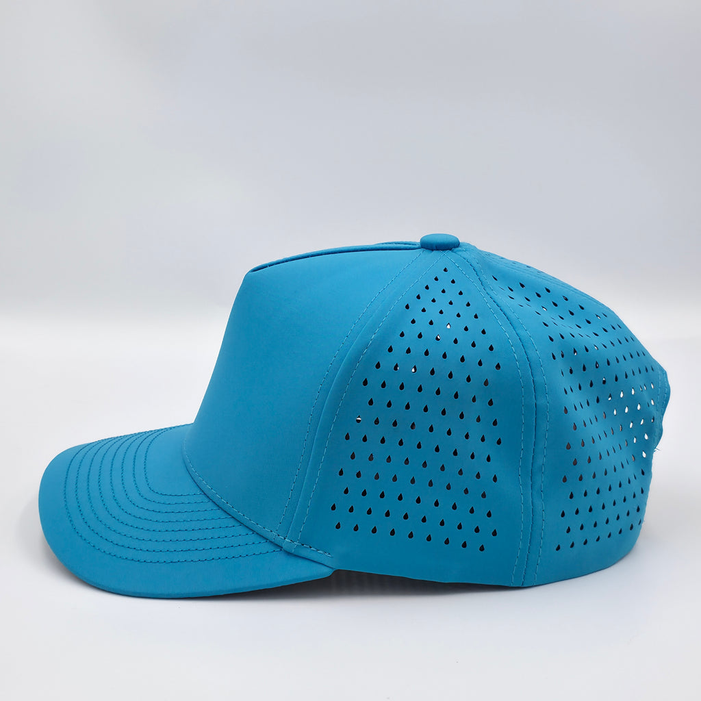 Blue cap with perforated design on a white background variant-classic-57cm-to-59cm-havablue