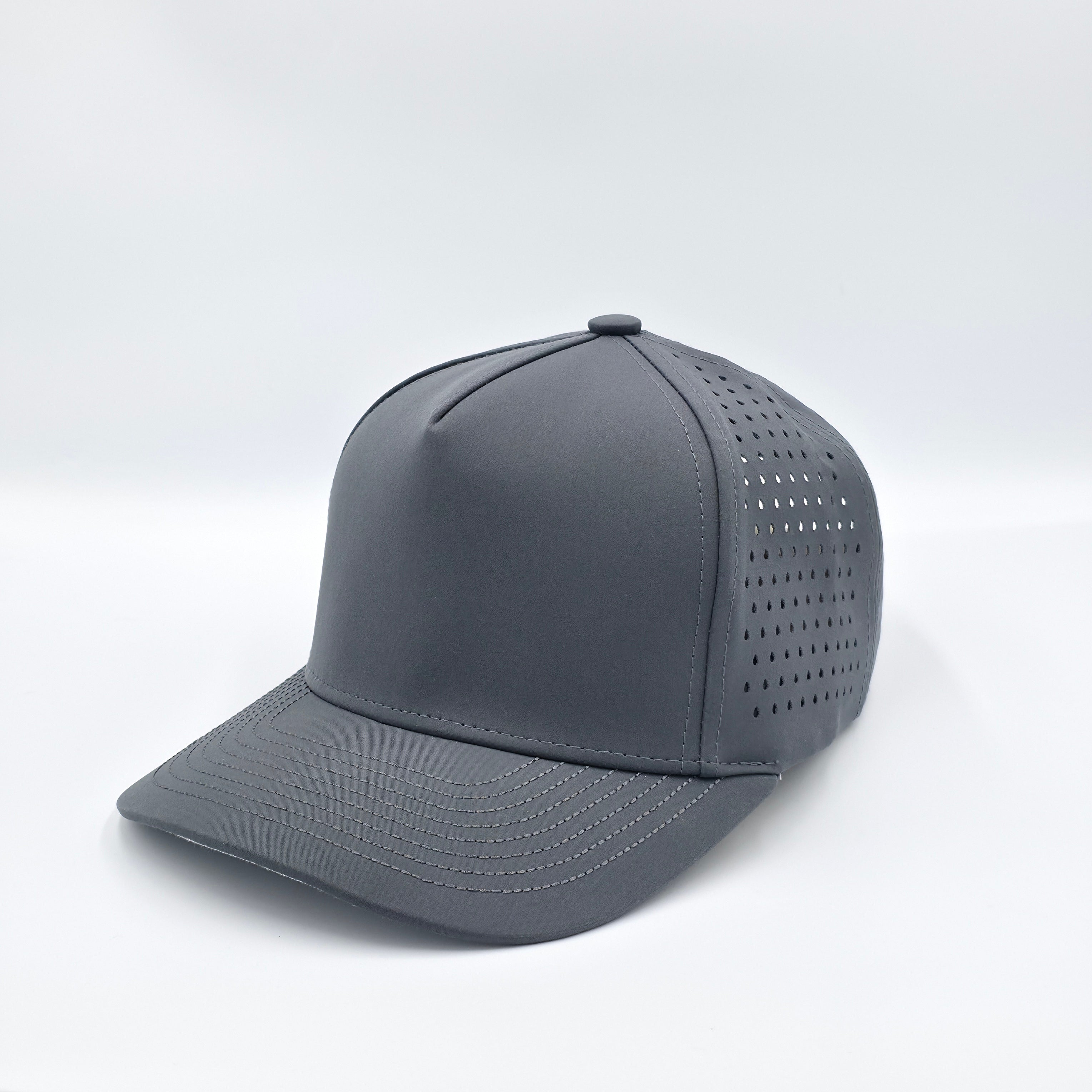 Gray cap with perforated design on a white background variant-classic-57cm-to-59cm-carbon-charcoal