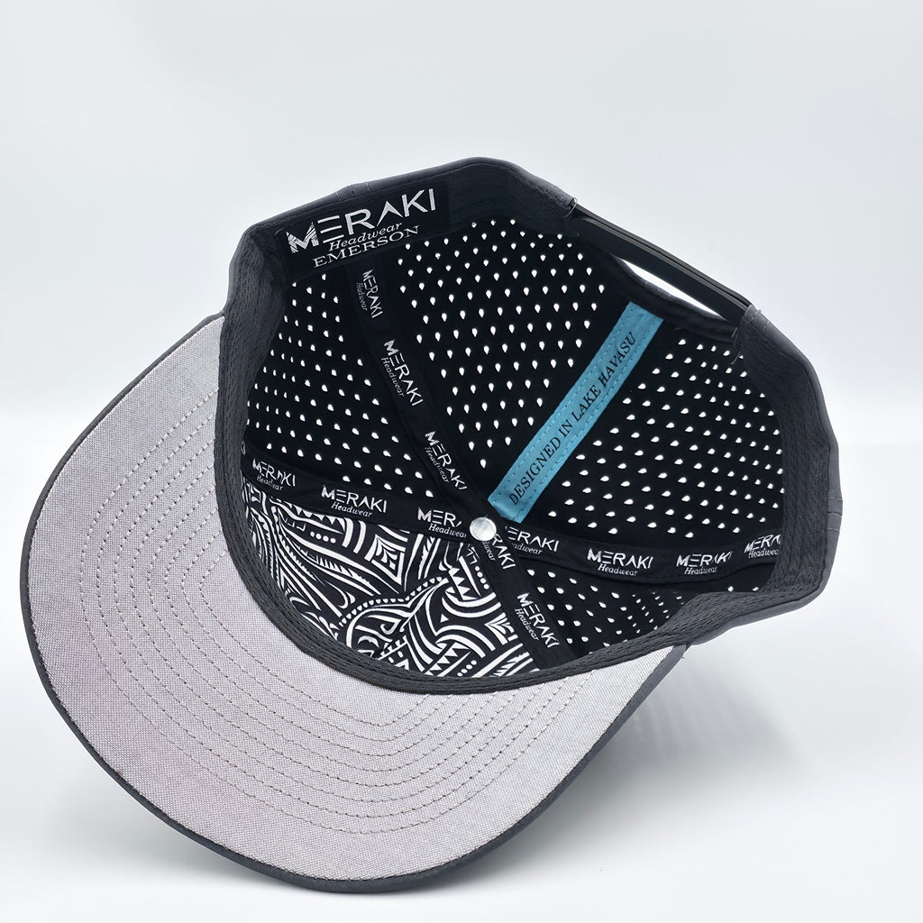 Black and gray cap with patterned brim on a light gray background variant-classic-57cm-to-59cm-carbon-charcoal