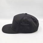 Black cap with perforated design on a white background variant-midnight-black