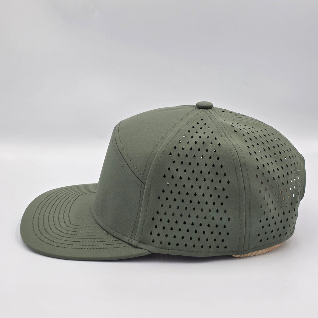 Green baseball cap with perforated design on a white background variant-stratos-green