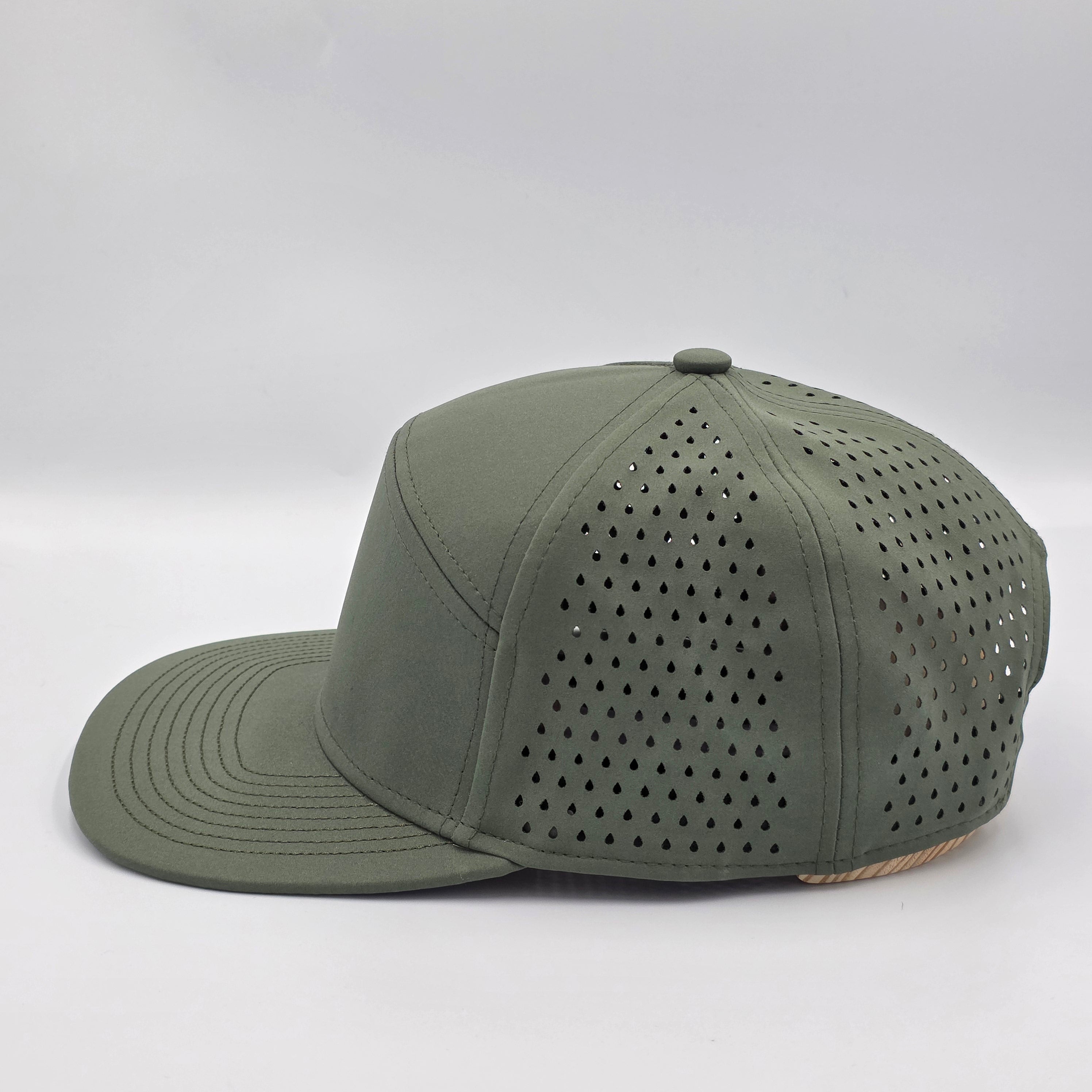 Green baseball cap with perforated design on a white background variant-stratos-green