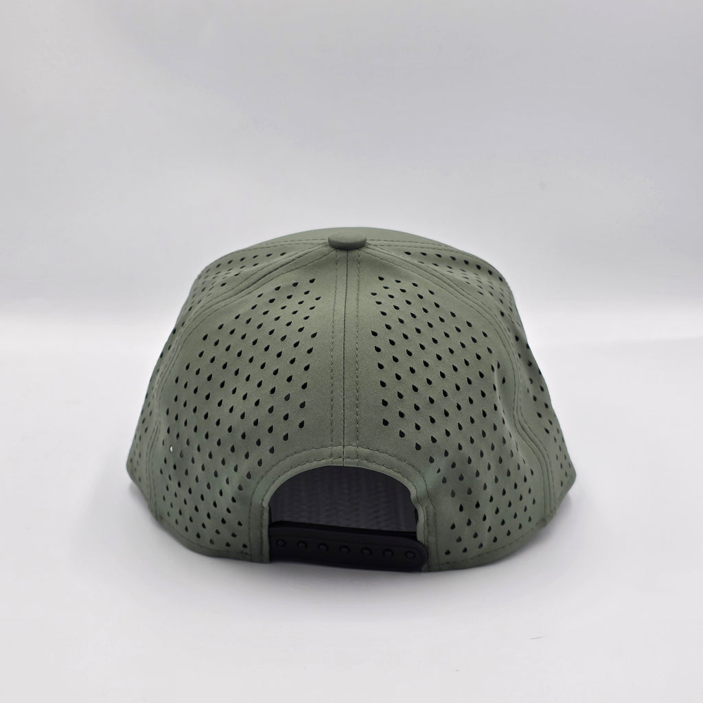 Green cap with perforated design on a white background variant-stratos-green
