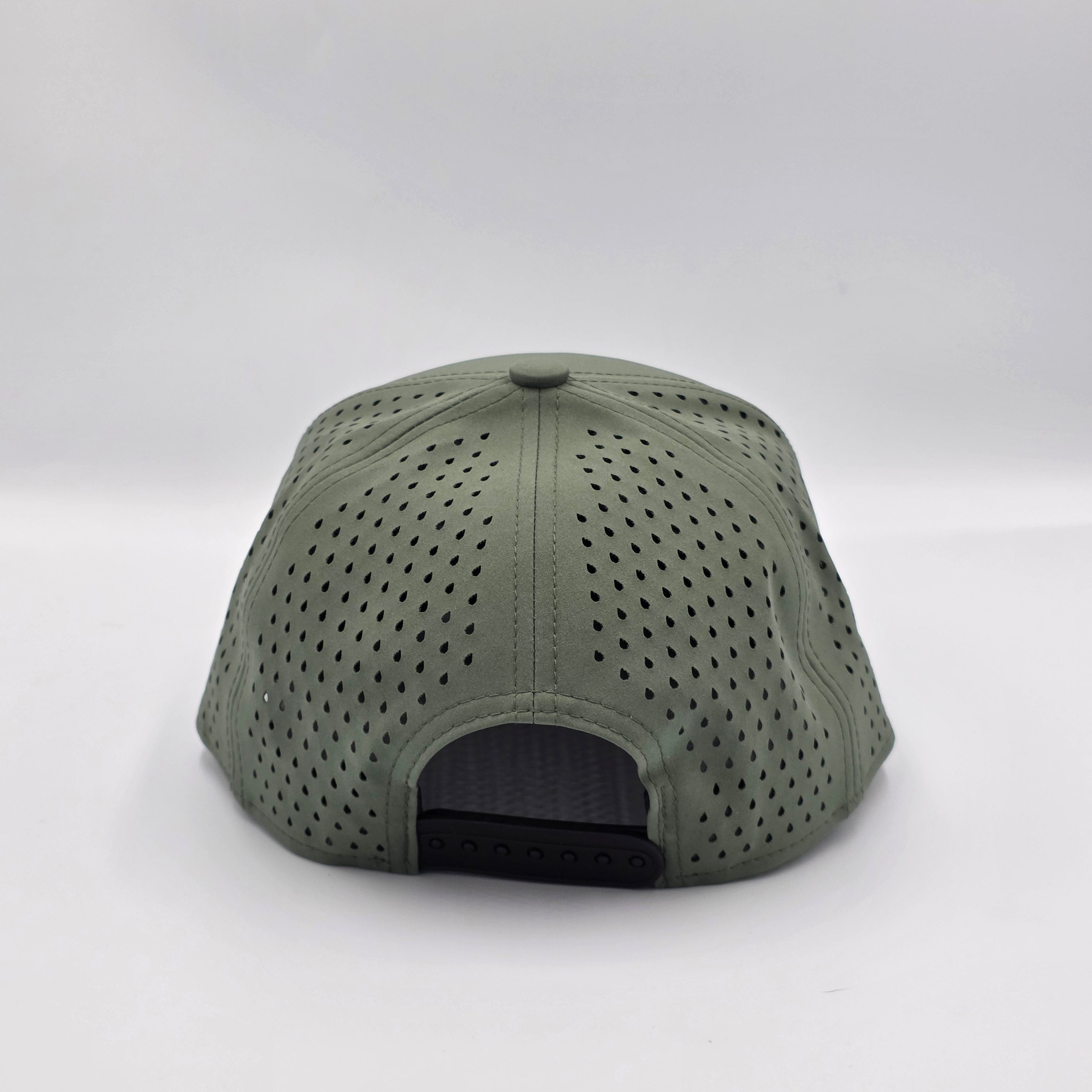 Green cap with perforated design on a white background variant-stratos-green