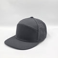 Gray cap with perforated design on a light gray background variant-carbon-charcoal