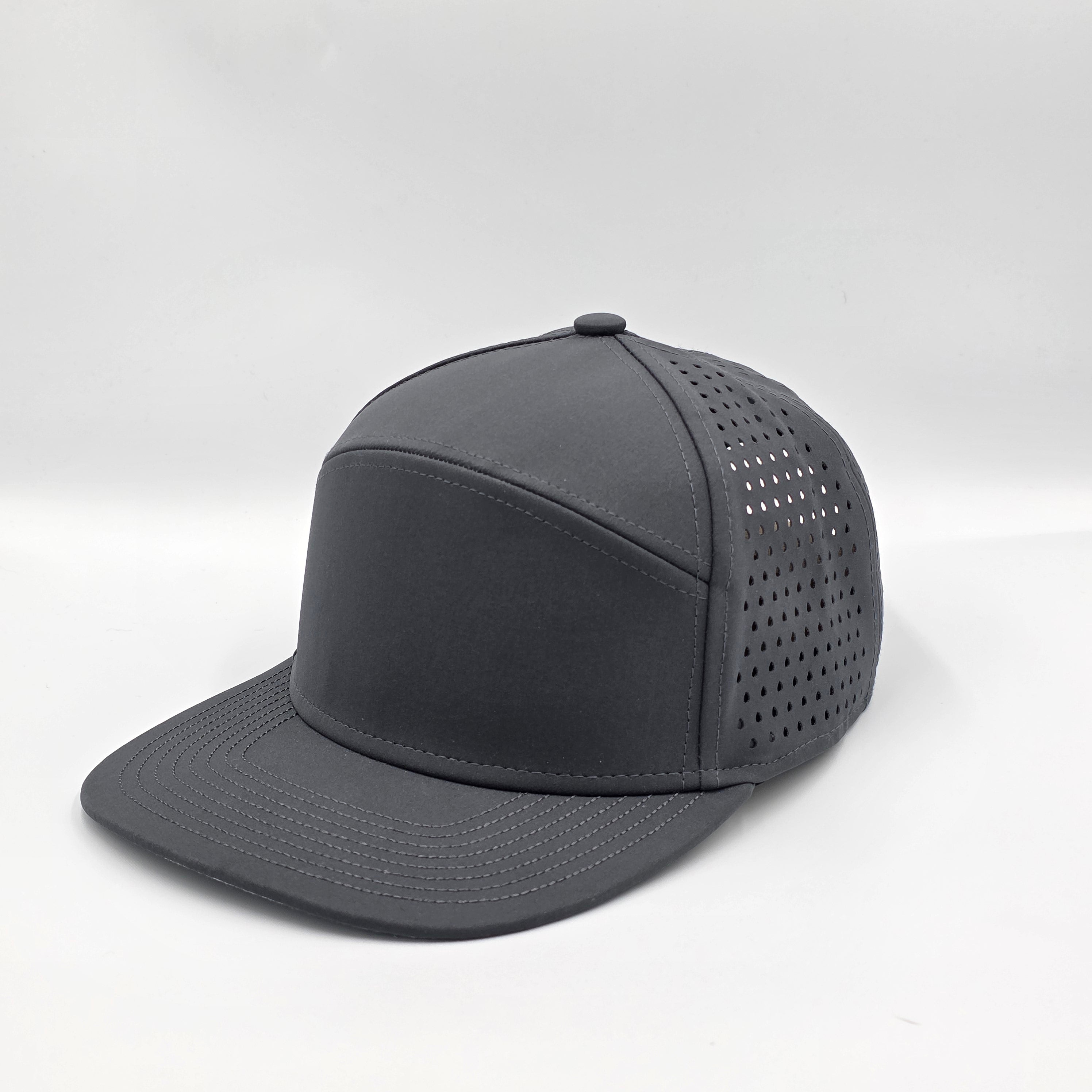 Gray cap with perforated design on a light gray background variant-carbon-charcoal