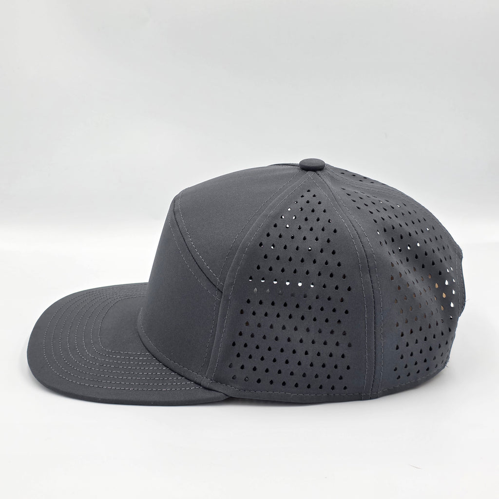 Gray cap with perforated design on a white background variant-carbon-charcoal