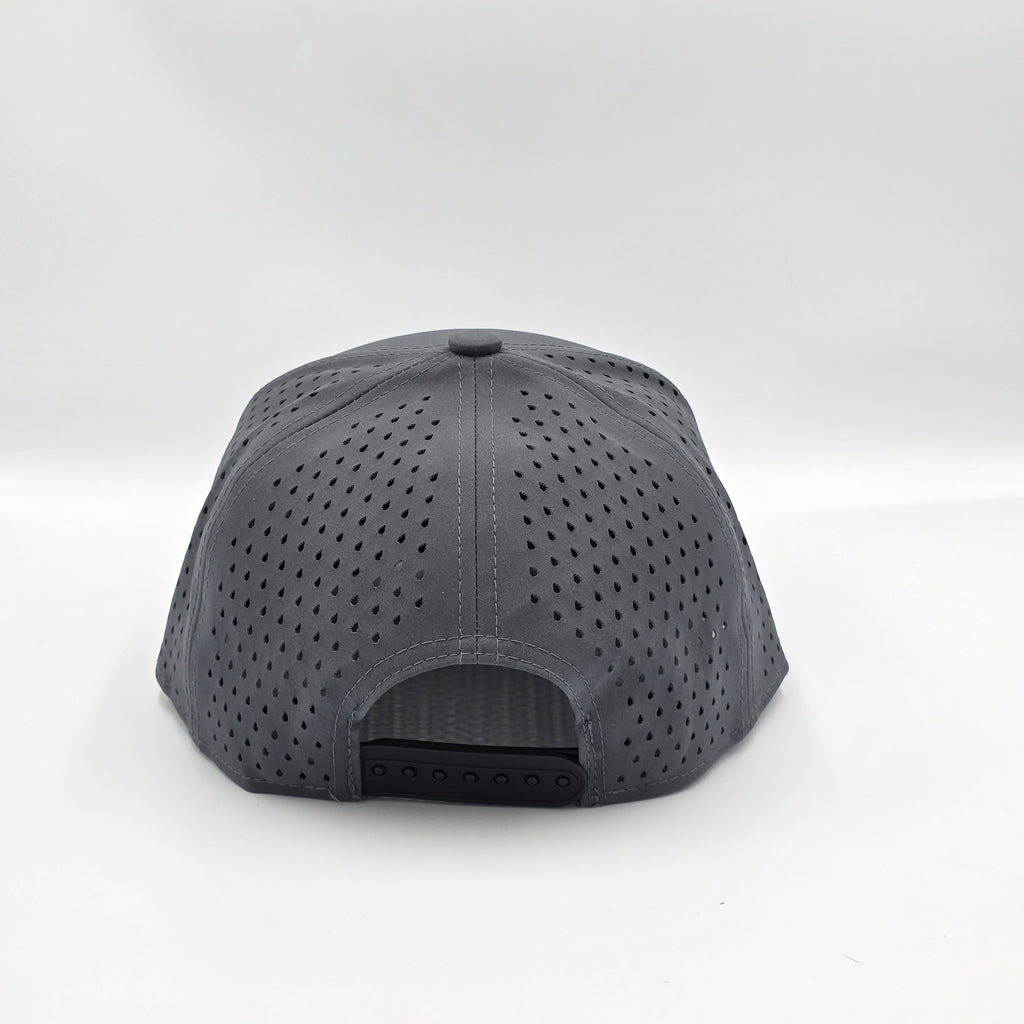 Gray cap with perforated design on a white background variant-carbon-charcoal
