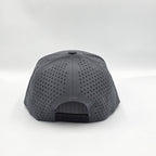 Gray cap with perforated design on a white background variant-carbon-charcoal
