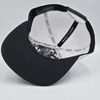 White cap with black brim on a gray background variant-polar-eclipse